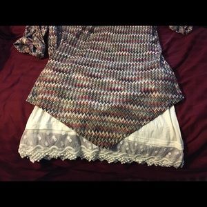 Sheer lace skirt trim to extend shirt and accent
